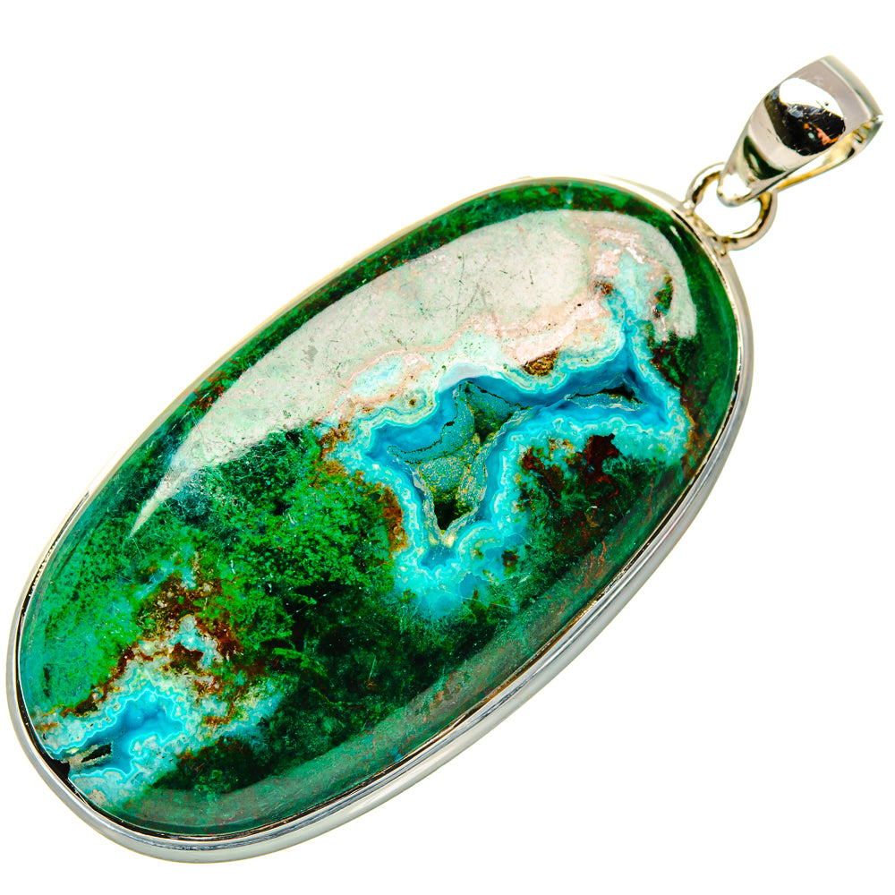 Oval pendant with green, blue stone pattern in silver bezel and loop bail