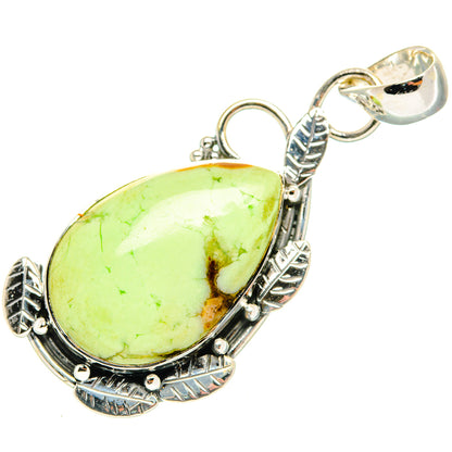 Oval lemon-green chrysoprase pendant in silver with carved side frame and hanging loop