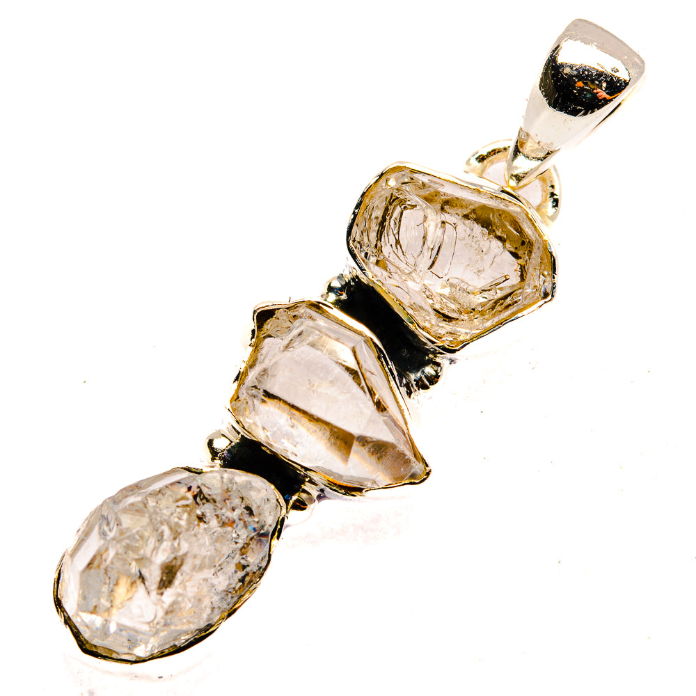 Faceted clear stone pendant with three rectangular settings and bail, gold-tone