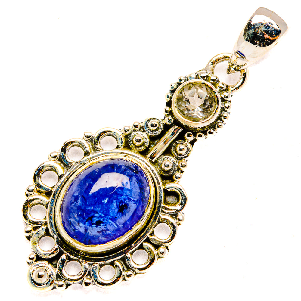 Sterling silver pendant with oval blue gemstone and ornate halo, with hanging loop