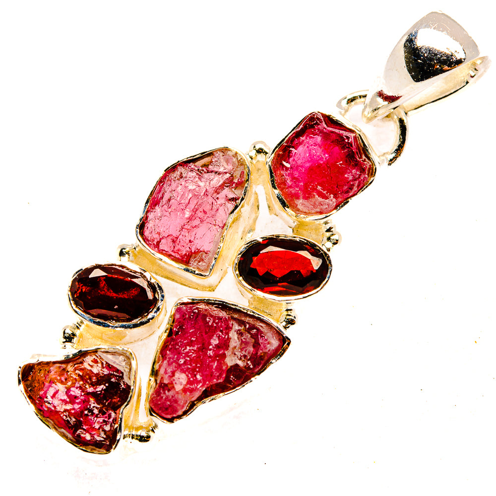Sterling silver pendant with rough pink tourmaline and red garnet gemstones, openback bail