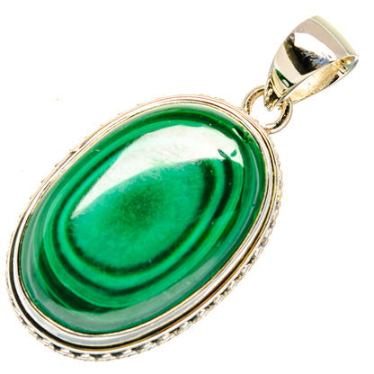 Malachite pendant in oval 925 sterling silver bezel, green stone with ridged edge.