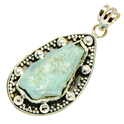 Rough aquamarine pendant, teardrop oval sterling silver bezel with bail and bead trim
