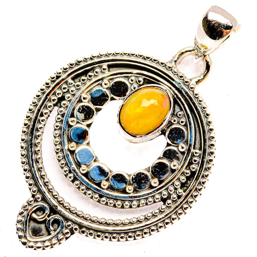 Sterling silver opal pendant, round yellow opal center with blue accents, ornate setting