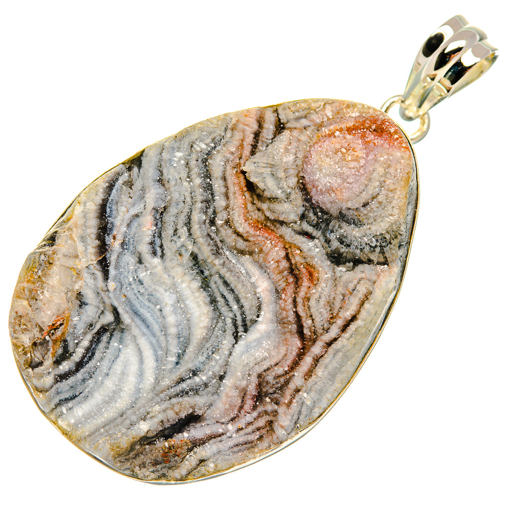 Oval desert druzy pendant with silver bail; gray stone with pink and rust bands