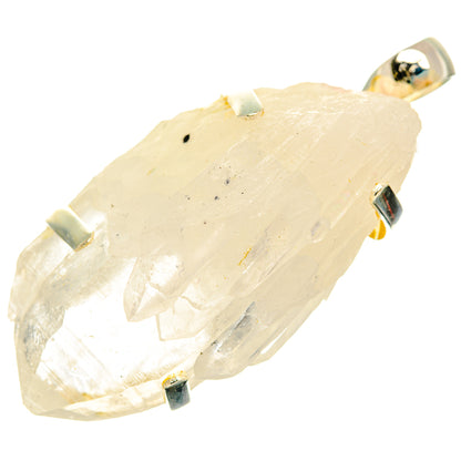 Pale yellow quartz crystal pendant with silver bail, faceted raw cluster
