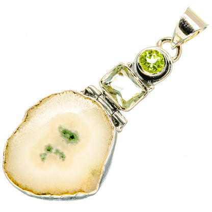 Heart-shaped white quartz pendant with green crystal accents and 925 sterling silver bail