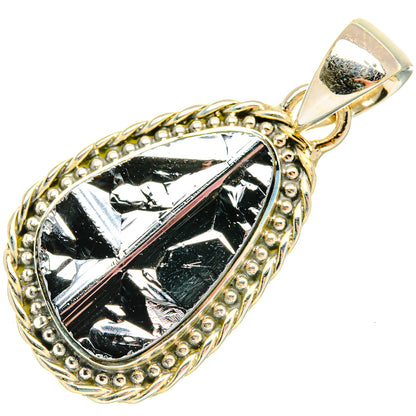 Sterling silver shungite pendant with teardrop black stone and ornate bezel, loop bail