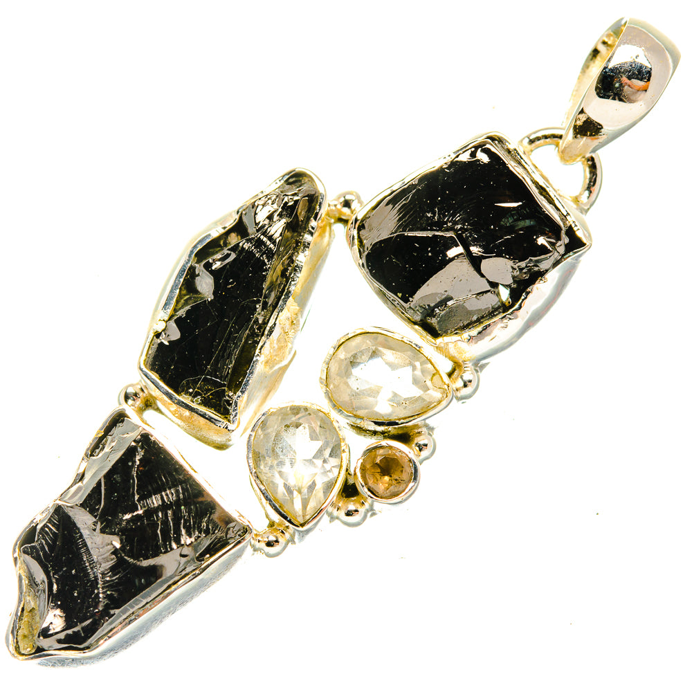 Sterling silver pendant with rough black shungite, clear quartz and small yellow stone