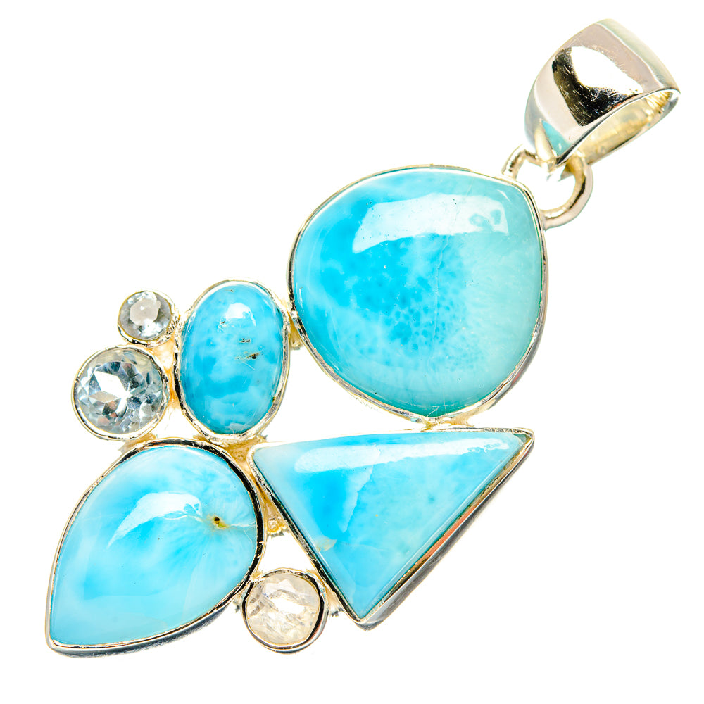 Blue gemstone pendant with oval and teardrop stones, bezel-set in gold-tone metal bail