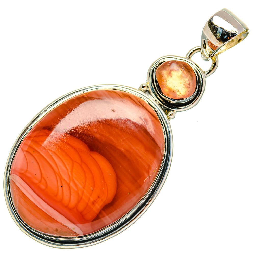Sterling silver gemstone pendant with large oval orange-red cabochon and round pink stone