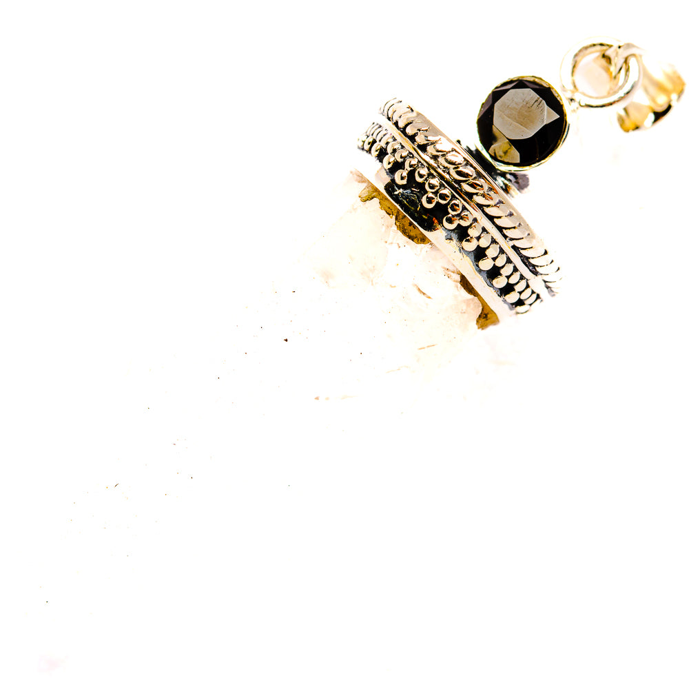 Sterling silver pendant with rough white quartz and black onyx, ornate bezel setting