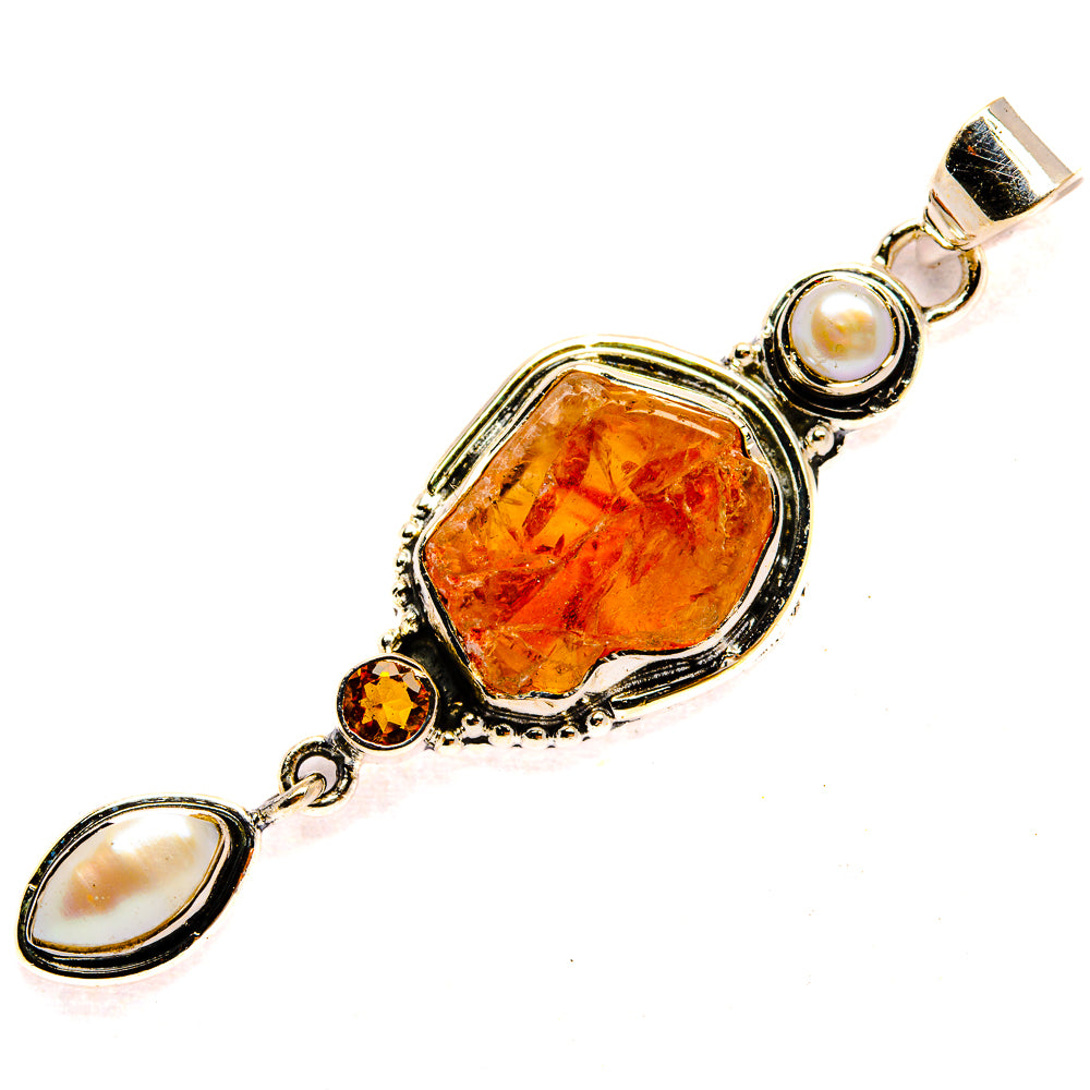Sterling silver pendant with rough orange carnelian, cultured pearls, and small orange stones