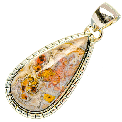 Sterling silver lace agate teardrop pendant, ornate edge frame with tan and orange stone