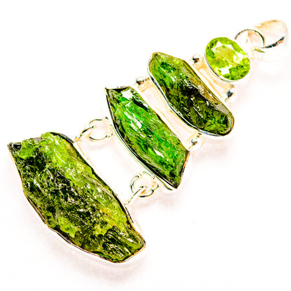 Sterling silver pendant with two rough green faceted stones in silver prongs
