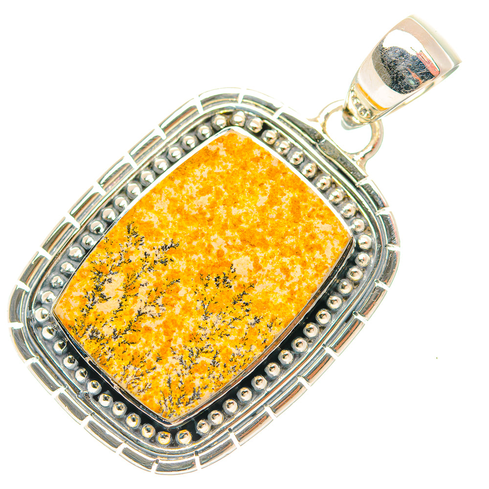 Sterling silver pendant with rectangular yellow dendrite stone, ornate frame, loop bail