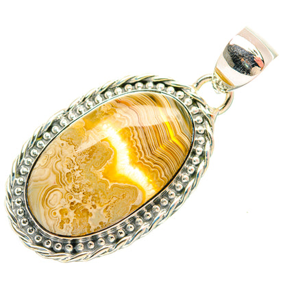 Lace agate pendant with oval bezel, beaded sterling border, and bail; yellow cabochon
