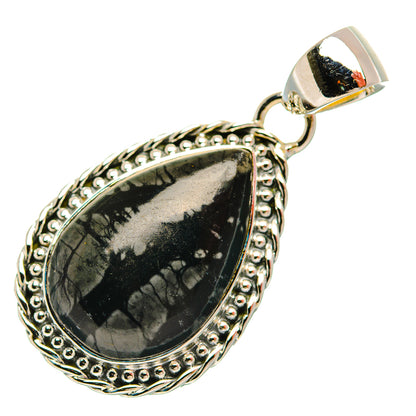 Sterling silver teardrop jasper pendant with ornate bezel and loop bail, black stone