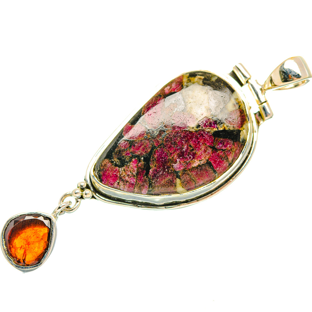 Silver oval pendant with marbled green-pink stone and round orange gemstone drops