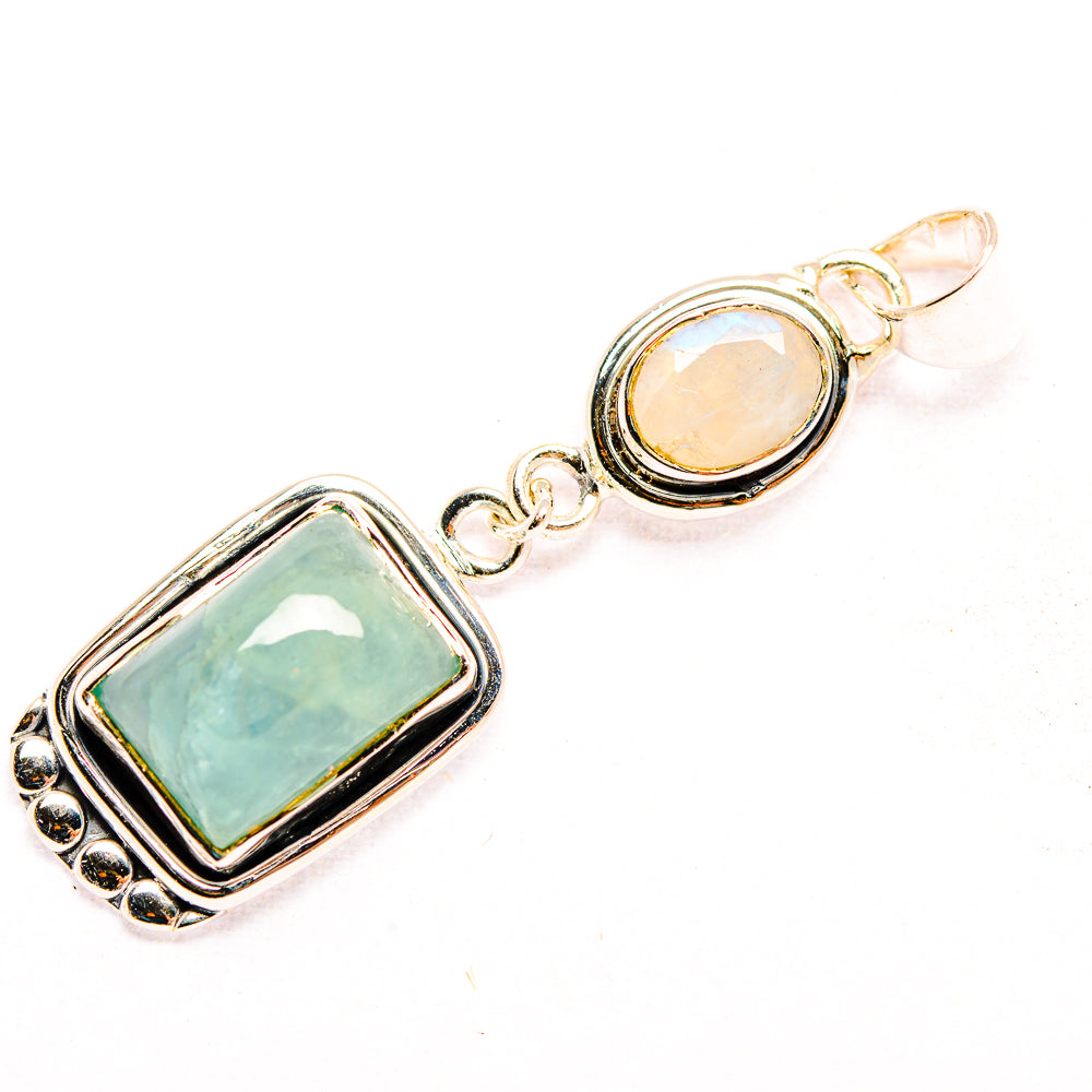 925 silver pendant: rectangular aquamarine-toned stone and round opal cabochon