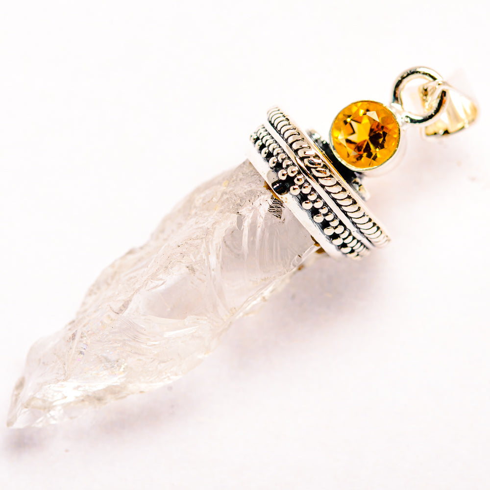 Sterling silver pendant with rough white quartz and round citrine gemstone, bezel set