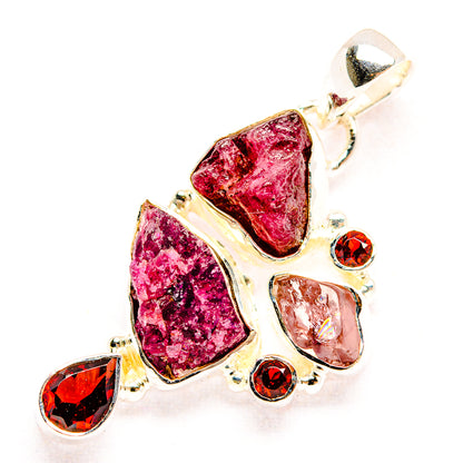 925 sterling silver pendant with rough magenta stones and red dangling garnets