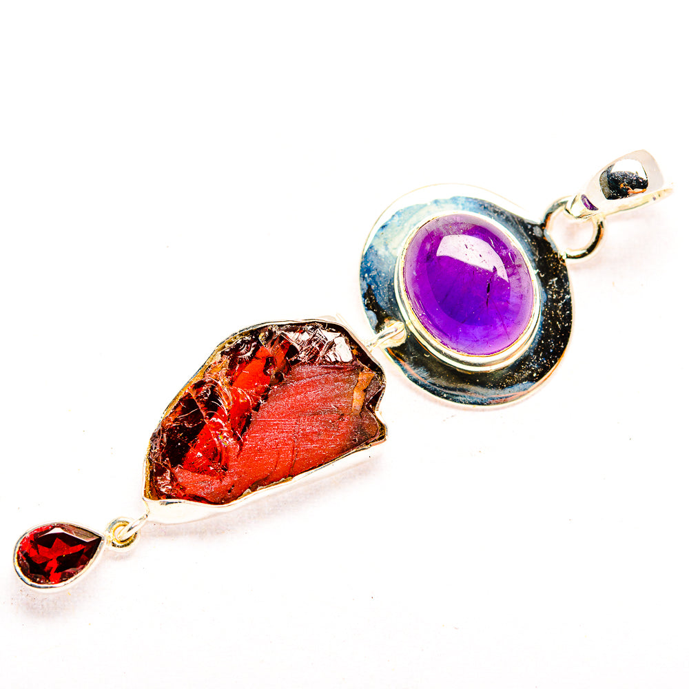 Sterling silver pendant with purple amethyst and red rough garnet stones