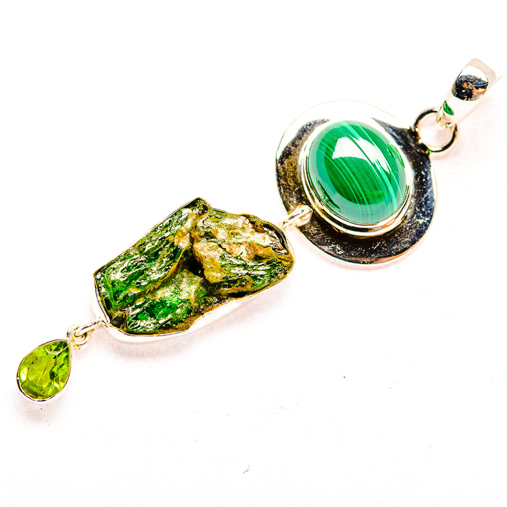 Sterling silver pendant with green malachite chunk and two round green gemstone accents