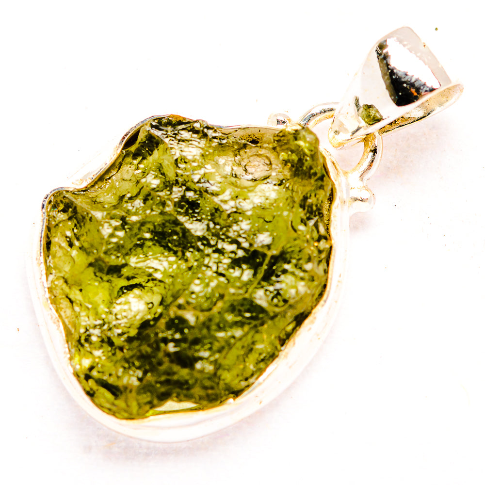 Sterling silver pendant with rough olive-green Moldavite stone in open bezel, bail
