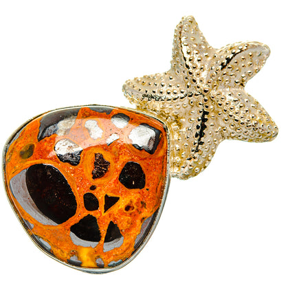 Bauxite pendant with orange, black-spotted stone and textured silver star bail