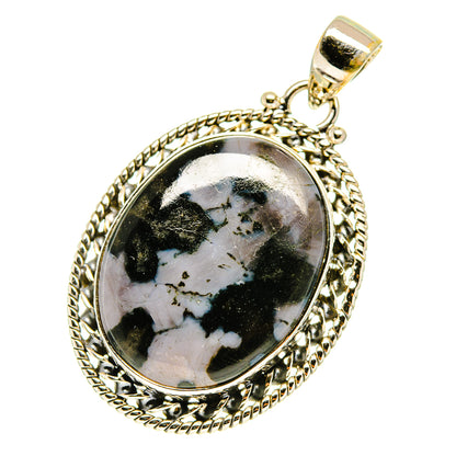 925 sterling silver oval pendant with black-and-white gabbro cabochon in ornate frame