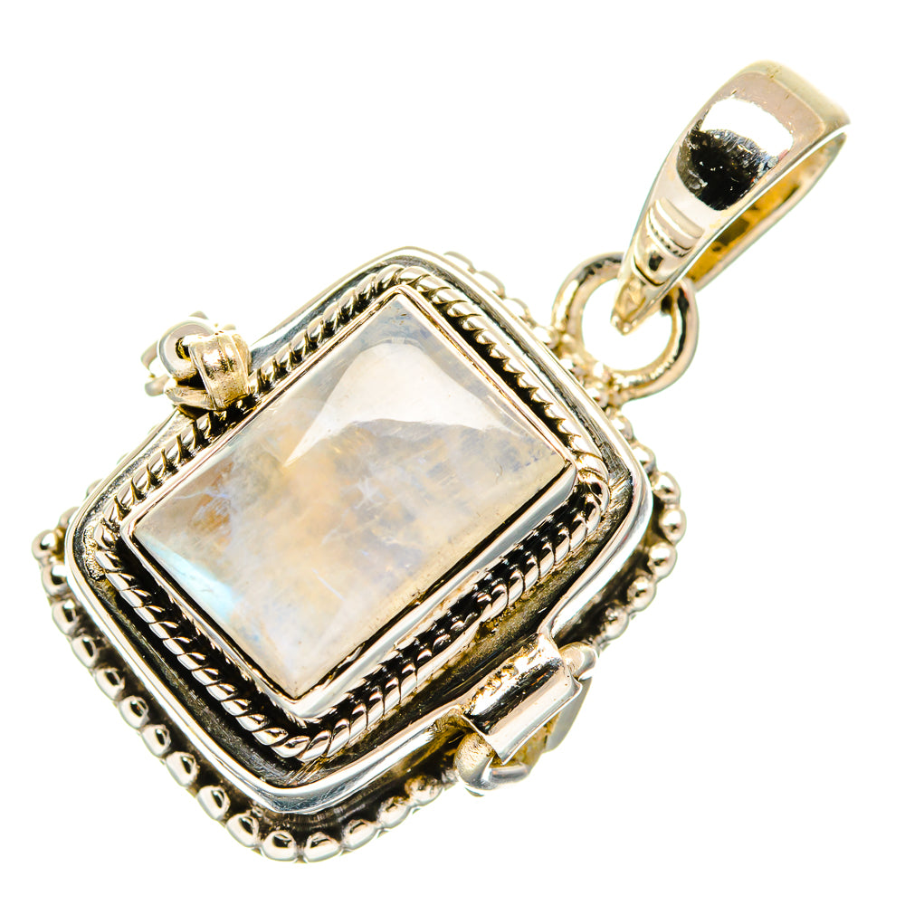 Sterling silver pendant, rectangular opal-like stone with rope border and hinged bail