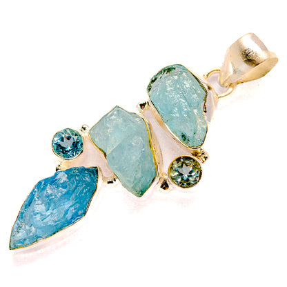 Rough aquamarine and blue topaz pendant with bezel-set gems and silver bail