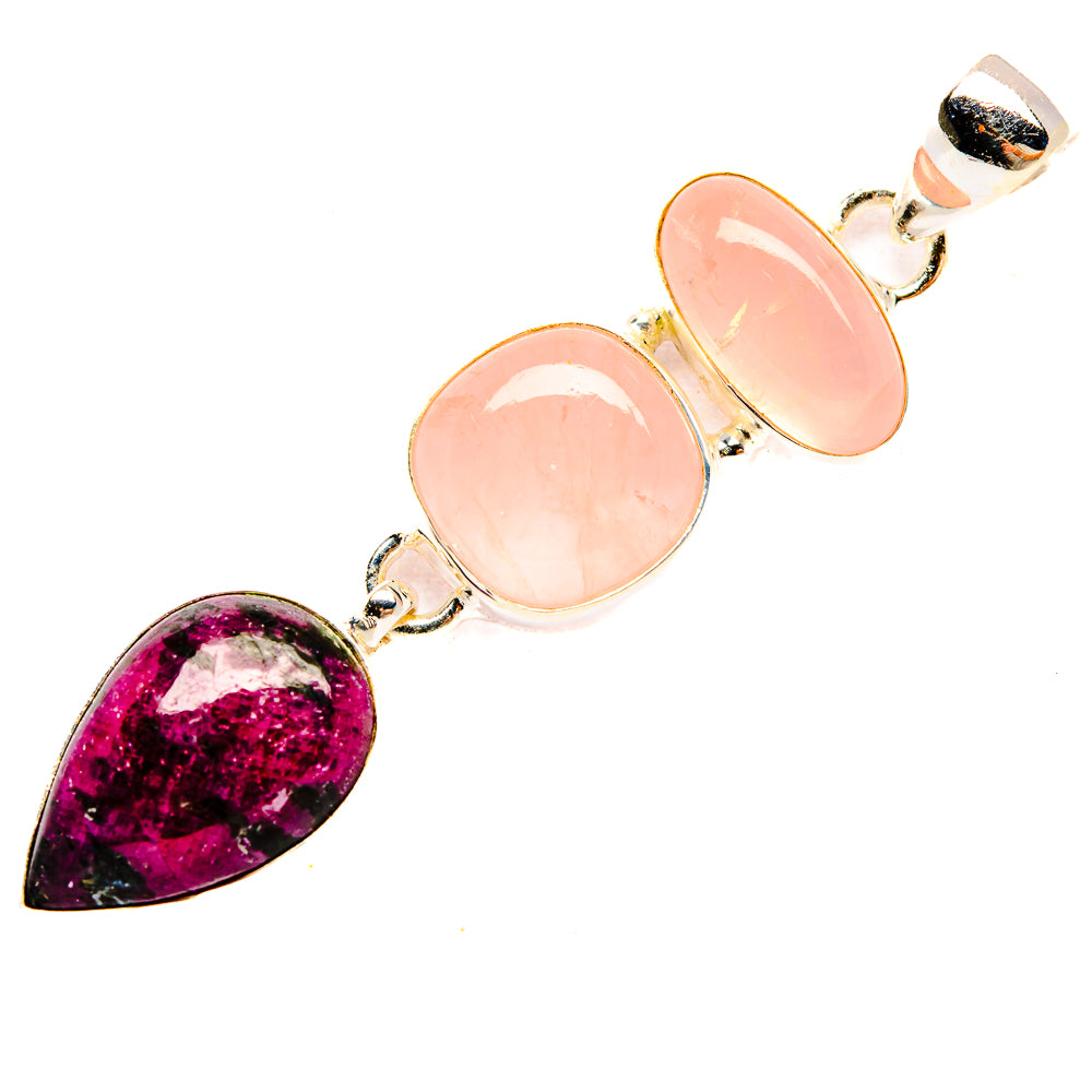 Gemstone pendant with magenta teardrop, two pink oval cabochons, and silver bail