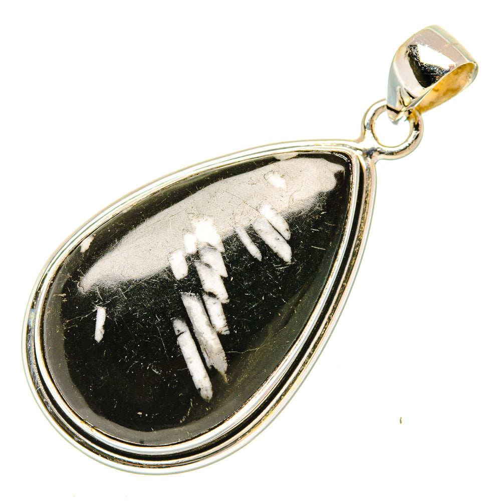 Sterling silver teardrop pendant with black stone and white carved pattern