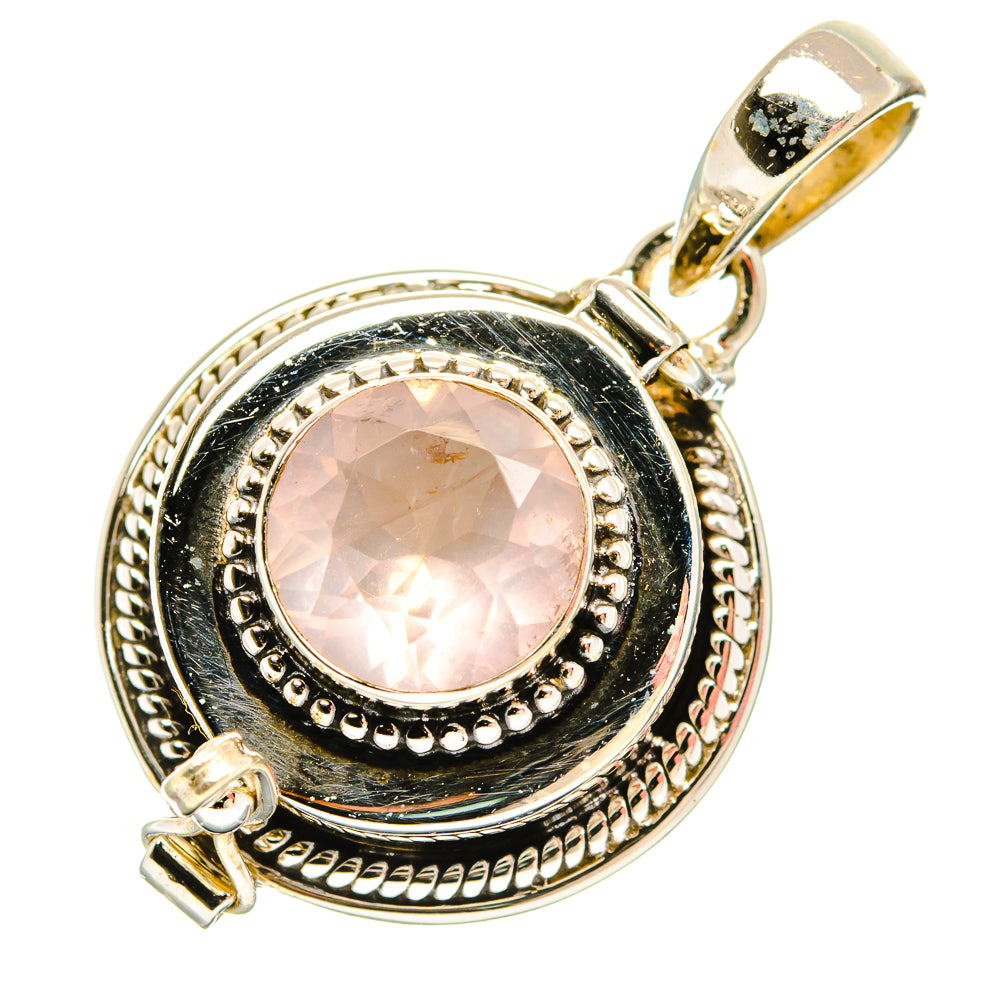 Round rose quartz pendant with black stone setting and loop bail, textured 925 silver