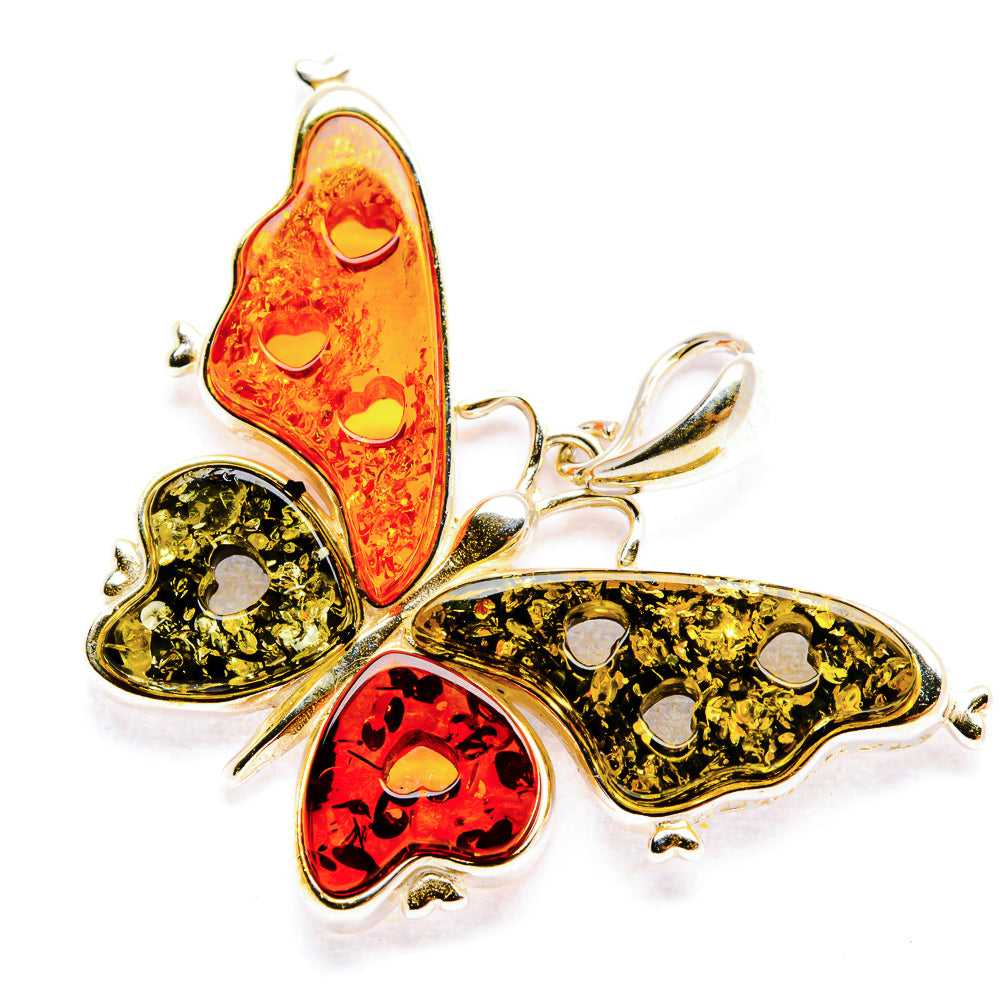 Amber butterfly pendant with 925 sterling silver wings and red, yellow, and green centers