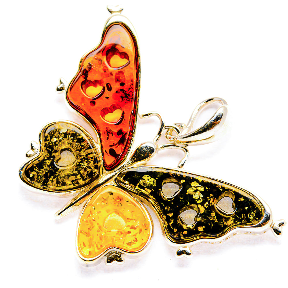 Sterling silver butterfly pendant with amber wings in orange, gold, and dark tones