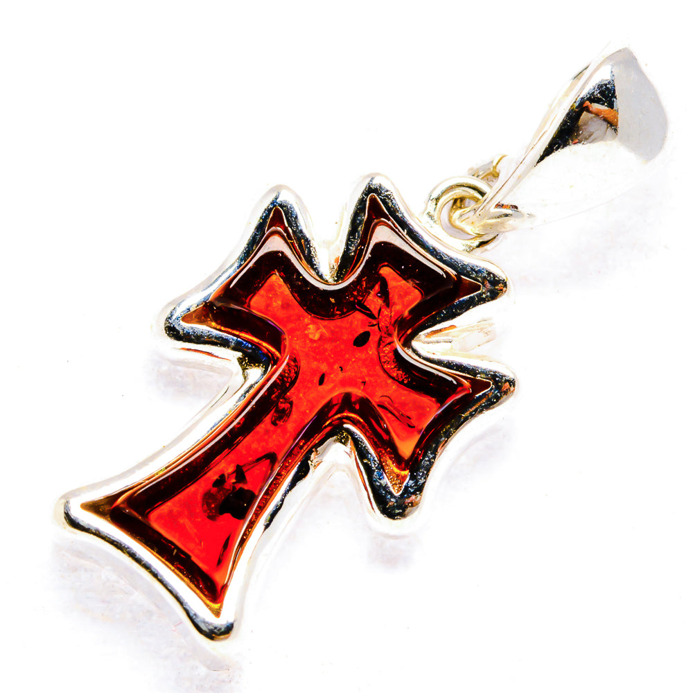 Sterling silver cross pendant with red amber stone and top bail for chain