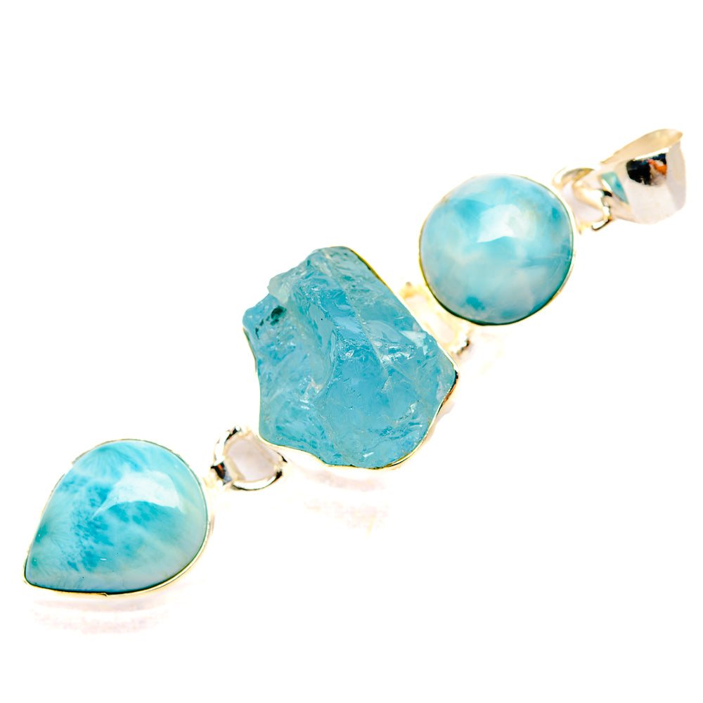 Pendant with two round Larimar cabochons and rough aquamarine centerpiece, metal setting