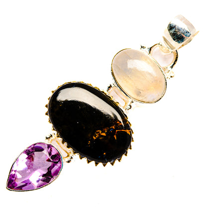 Sterling silver pendant with black oval stone, pale oval opal-like oval, and purple teardrop