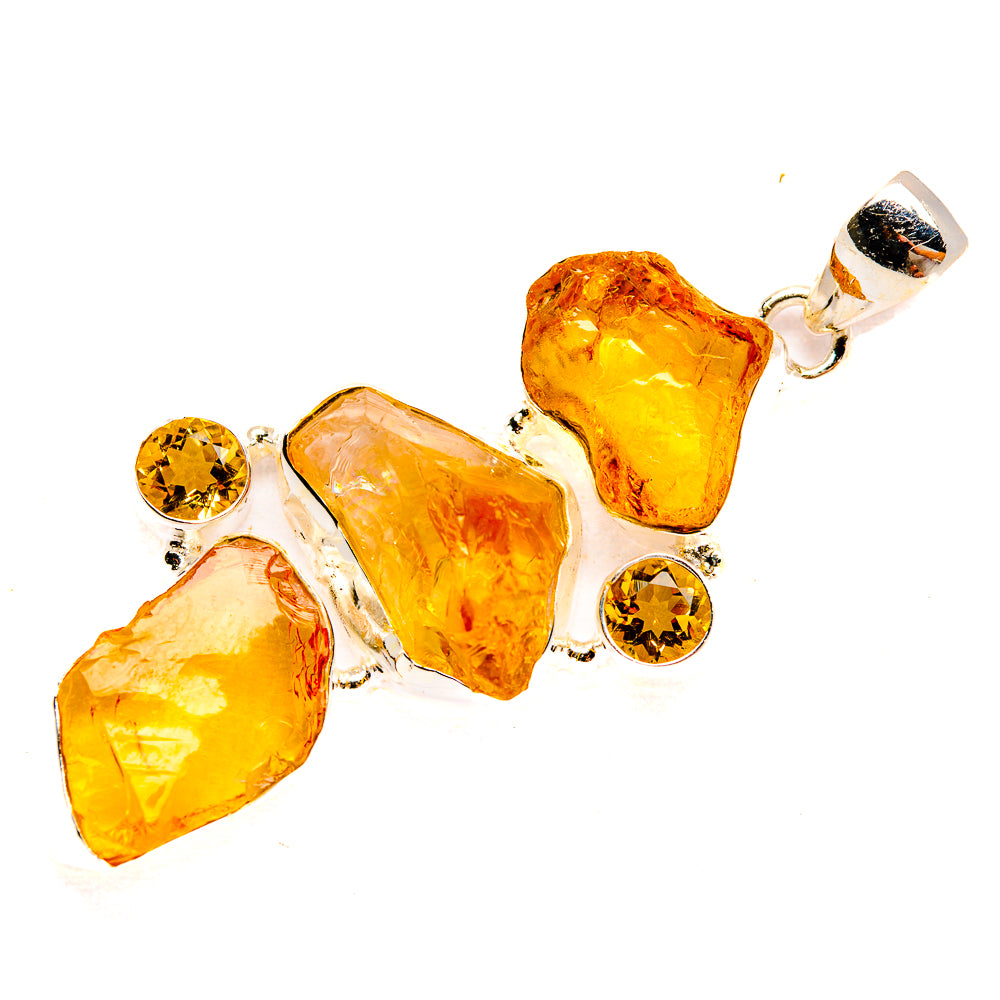 Rough citrine pendant in 925 sterling silver with faceted yellow-orange stones