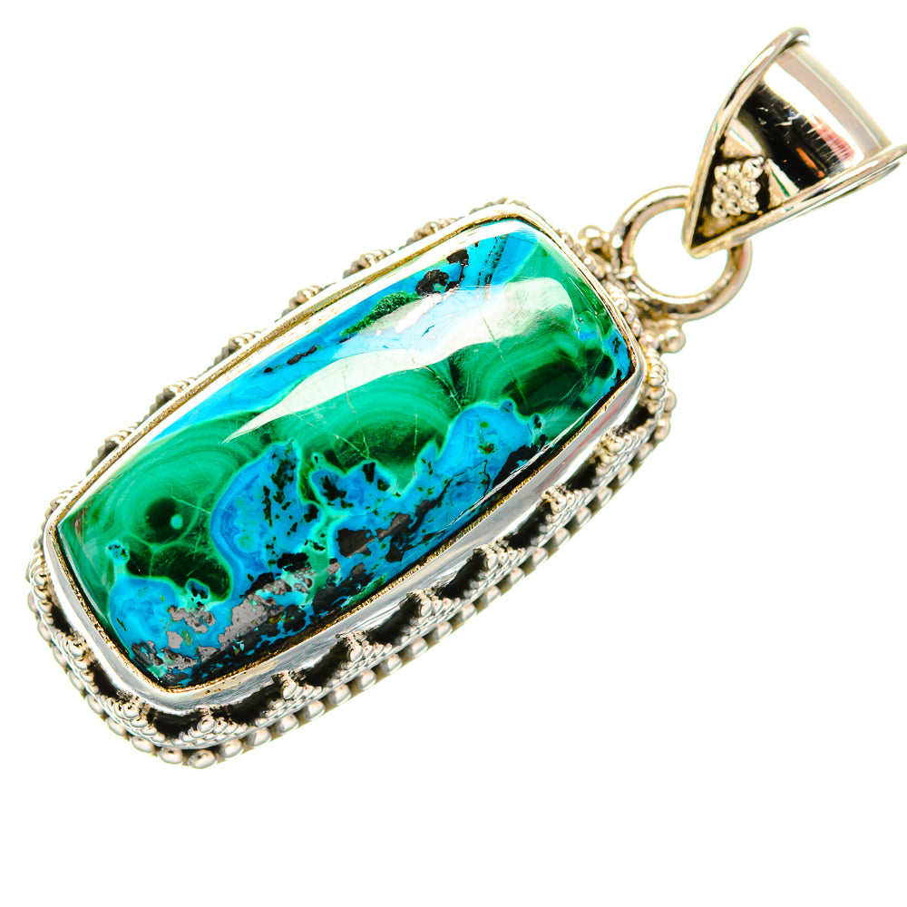 Long oval stone pendant with green-blue pattern, silver beaded frame and bail.