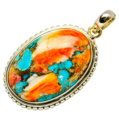 Oval turquoise and orange stone pendant in silver beaded setting with loop bail