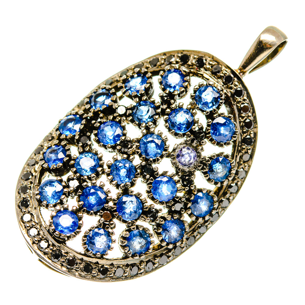 Faceted tanzanite pendant with oval blue stones and black accents on 925 silver