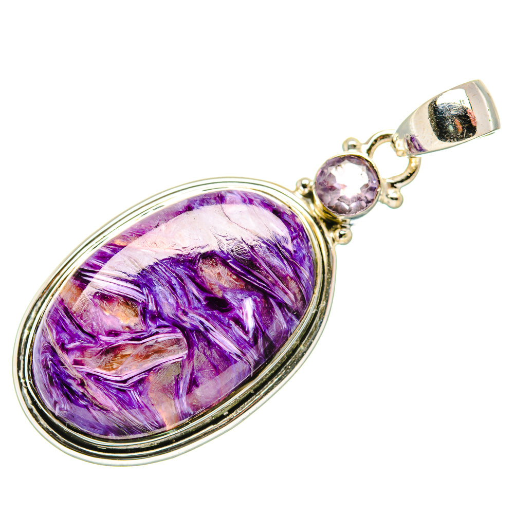 Oval charoite pendant in silver with purple cabochon and round stone bail