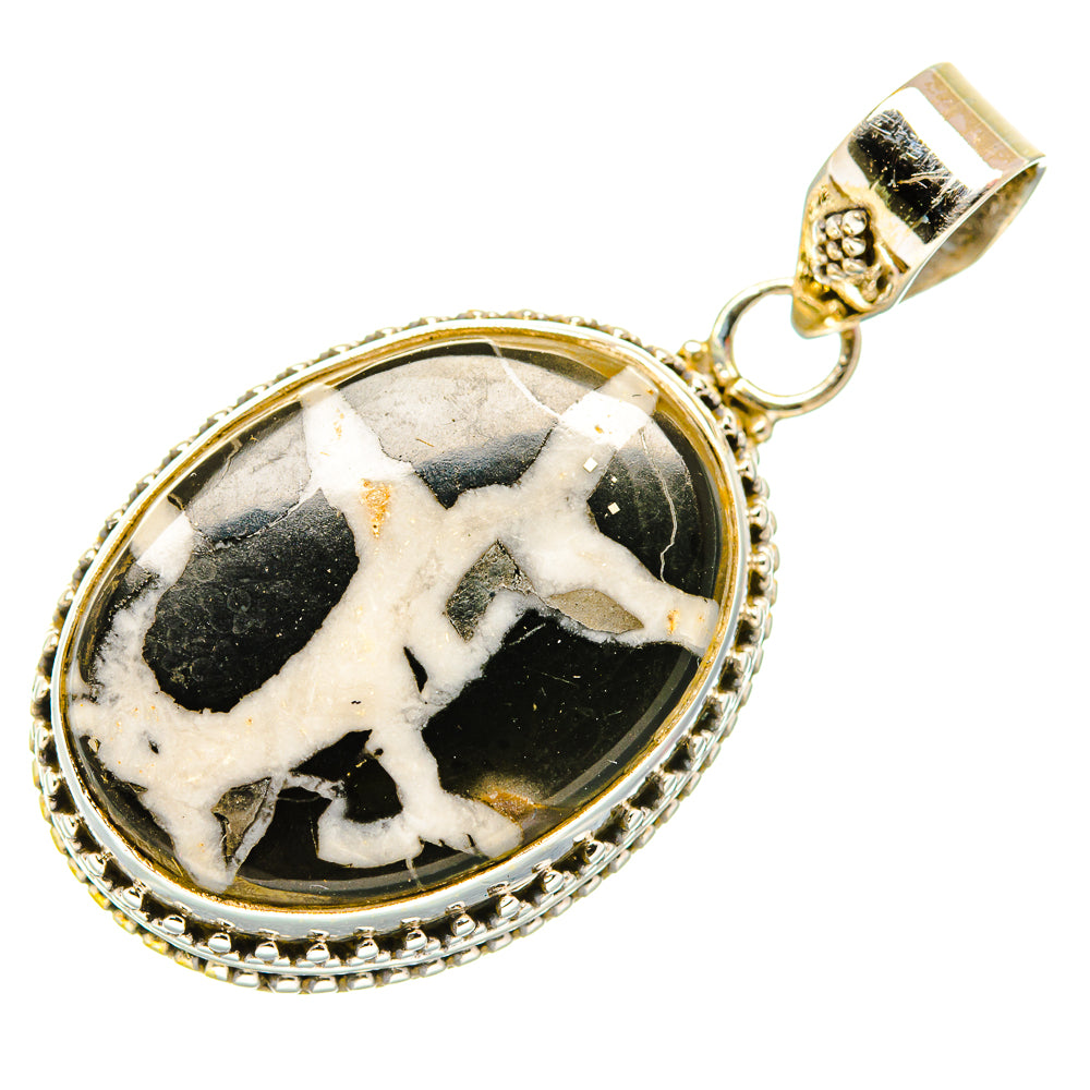 Septarian geode pendant, oval black-and-cream stone in silver bezel with bail
