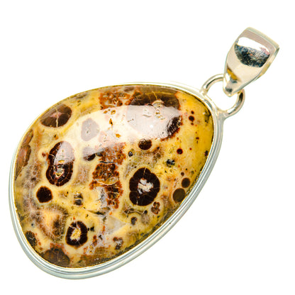 Oval poppy jasper pendant with silver bezel and bail, mottled earth-tone stone