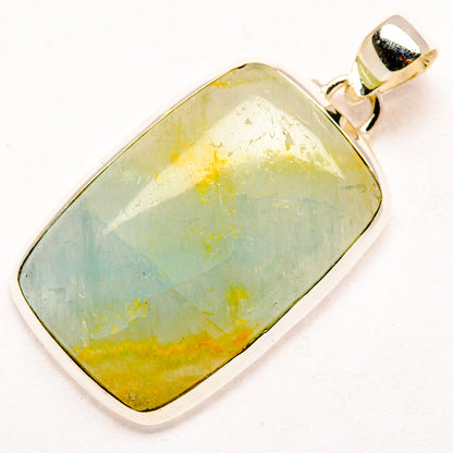 Natural aquamarine pendant in sterling silver, cushion-cut stone with blue-green and gold tones