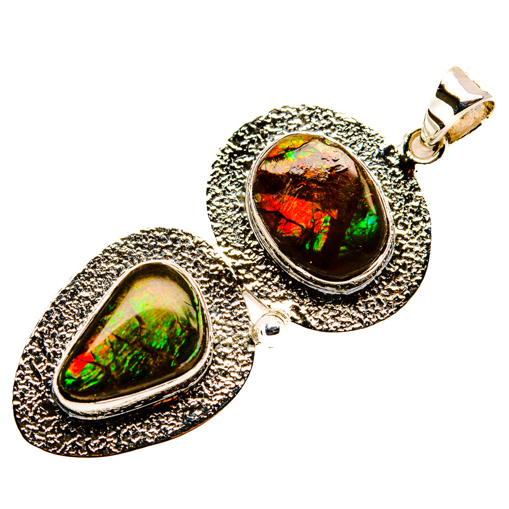 Sterling silver ammolite pendant with oval rainbow stone, textured bezel and loop bail